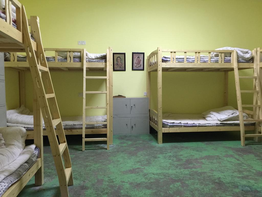 Pingyao Agam International Youth Hostel Номер фото